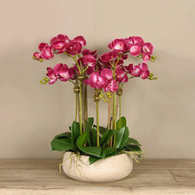 Load image into Gallery viewer, Artificial pink orchid centerpiece arrangement in beige planter Vivian Rose Shop