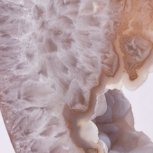 Load image into Gallery viewer, Close-up of a textured surface with a gradient from white to beige.
