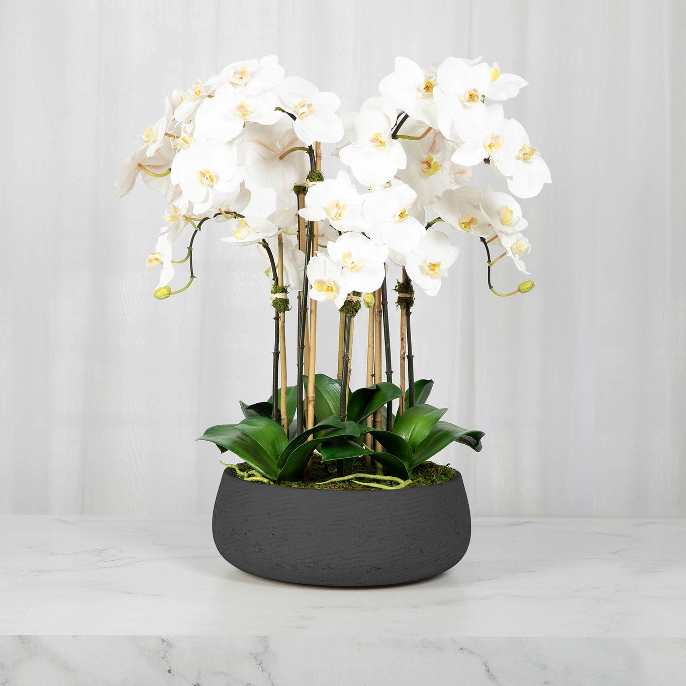 black and white planter pot Faux Orchid Centerpiece