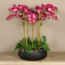 Load image into Gallery viewer, artificial floral arrangement centerpiece with pink orchids in black planter
