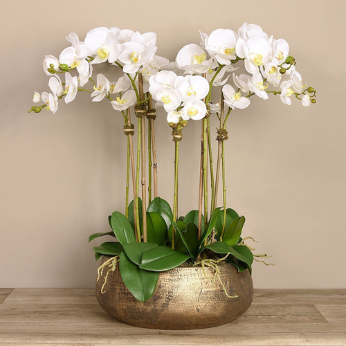 large orchid arrangement centerpiece in stunning gold ceramic planter table centerpiece white faux orchids